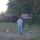 An image of a person walking their dog.