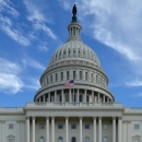 the dome of US Capitol in blue sky