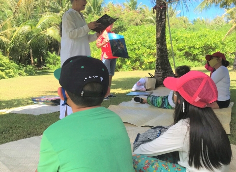 Children listening to a story at Guam National Wildlife Refuge
