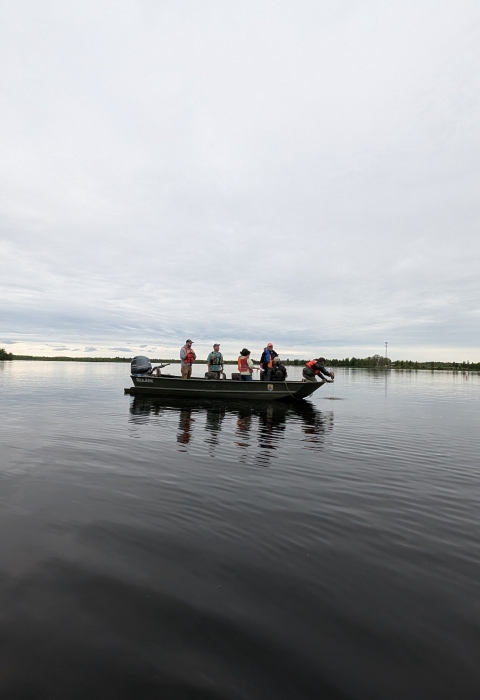 Boat with several people on it in Big Lake, Alaska.