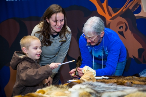 FWS and Friends staff deliver an education program to an event participant