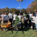 Group photo of participants at a refuge planting event