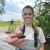 employee holding a freshwater mussel
