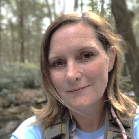 Kelley Myers Tymeson in forest