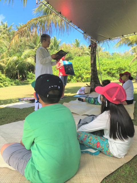 Children listening to a story at Guam National Wildlife Refuge