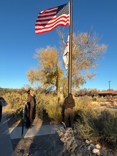 2 FWS staffers raise US flag and America 250-FWS flag