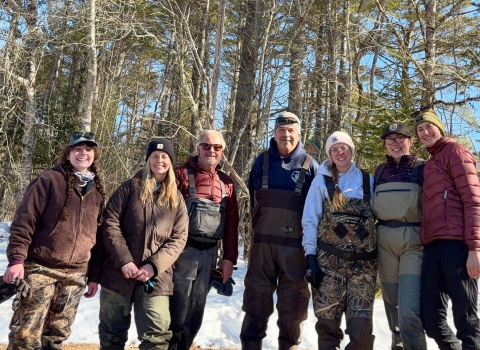 Group photo of the Atlantic salmon egg planting crew, consisting of biologists from the USFWS Gulf of Maine Coastal Program, USFWS Fisheries and Aquatic Conservation Program, and Maine Department of Marine Resources on the West Branch of the Sheepscot River